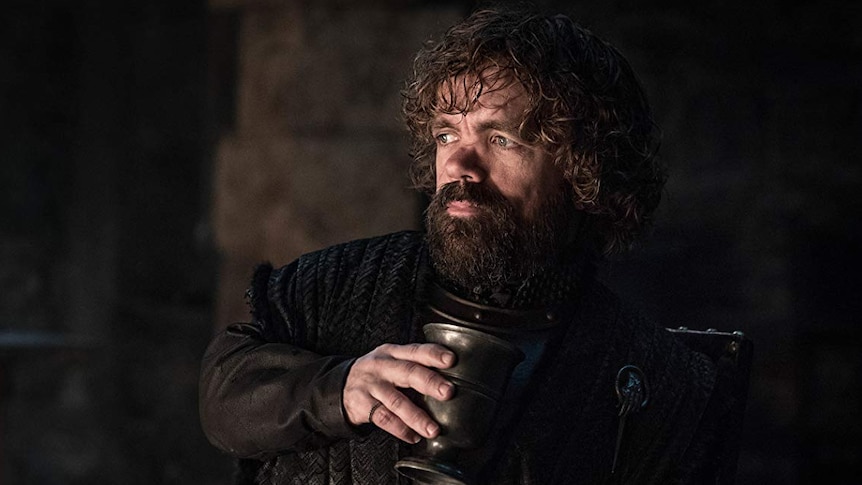 Tyrion holds a drink in a still image from HBO's Game of Thrones.