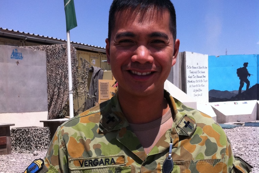 Padre Joel Vergara, pictured in Tarin Kot, says his job is to pray for everyone's safety and to be there for people.