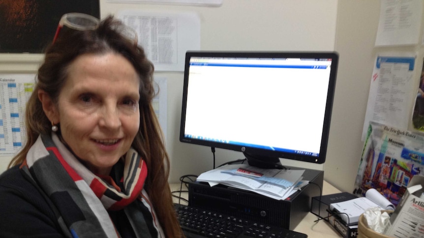 Researcher sitting in front of a computer