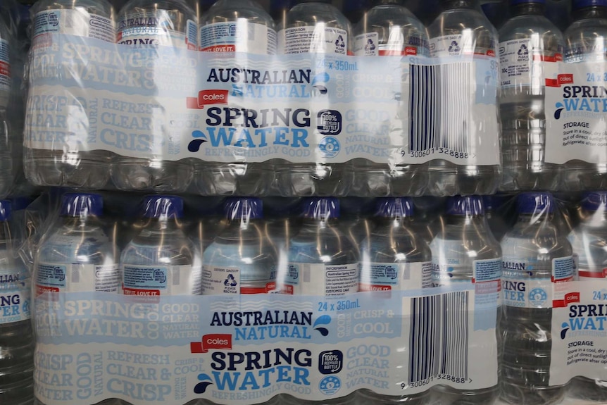 Large packs of coles bottled water.