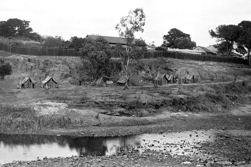 Huts owned by homeless people along the banks of the Torrens during the Depression