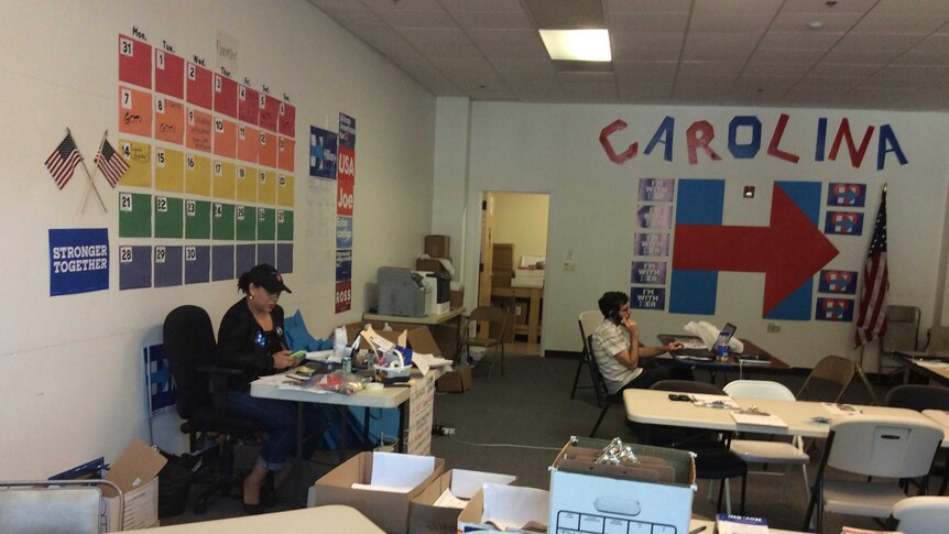 Campaign volunteers at work at their desks in the campaign office.