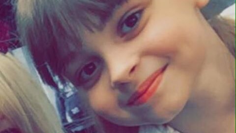 Saffie smiles in a tight shot
