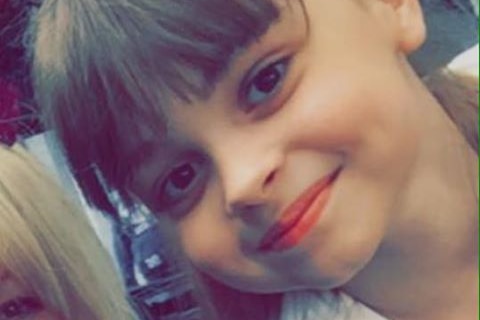 Saffie smiles in a tight shot