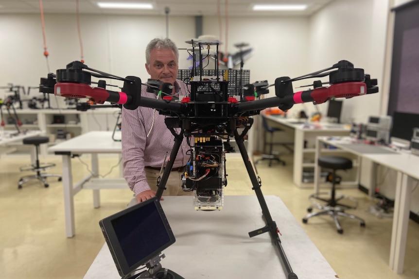 Professor Anthony Finn with a drone