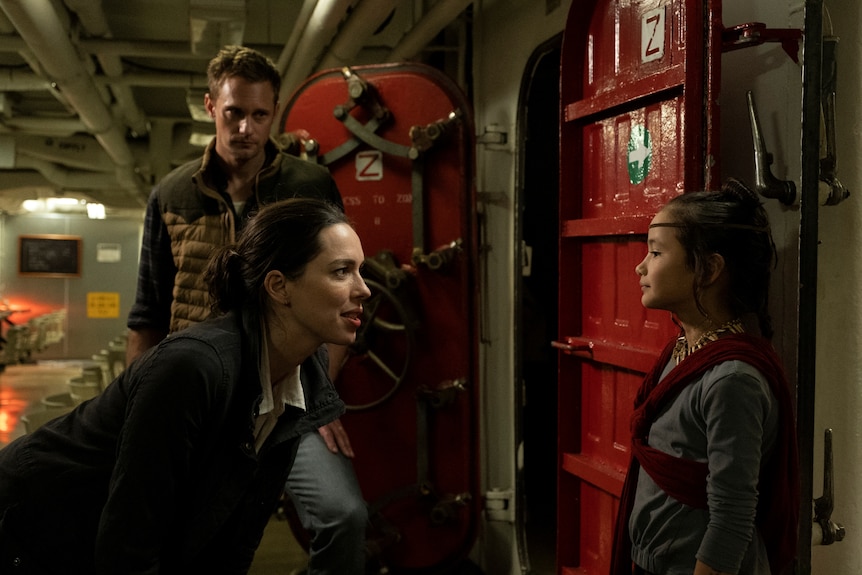 Rebecca Hall talking to Kaylee Hottle on a ship in Godzilla vs. Kong