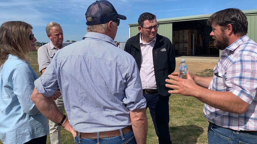 Victorian Premier Daniel Andrews speaks with drought-affected East Gippsland farmers during a visit to Bengworden.