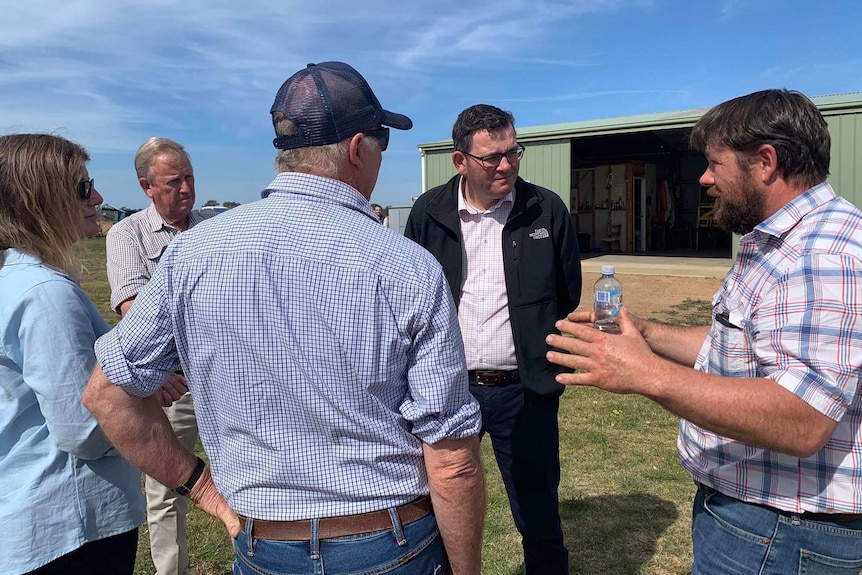 Victorian Premier Daniel Andrews speaks with drought-affected East Gippsland farmers during a visit to Bengworden.