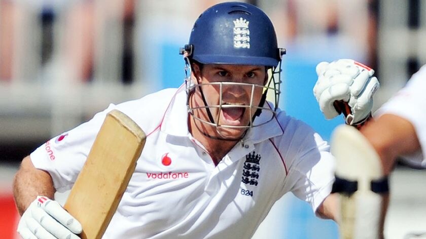 England captain Andrew Strauss celebrates his 15th Test century in Antigua.
