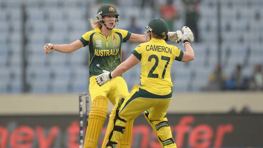 Perry and Cameron embrace after winning World Twenty20