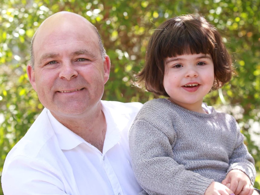 John Allie with his daughter