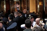 Donald Trump waves to supporters outside the front door of Trump Tower on fifth avenue.
