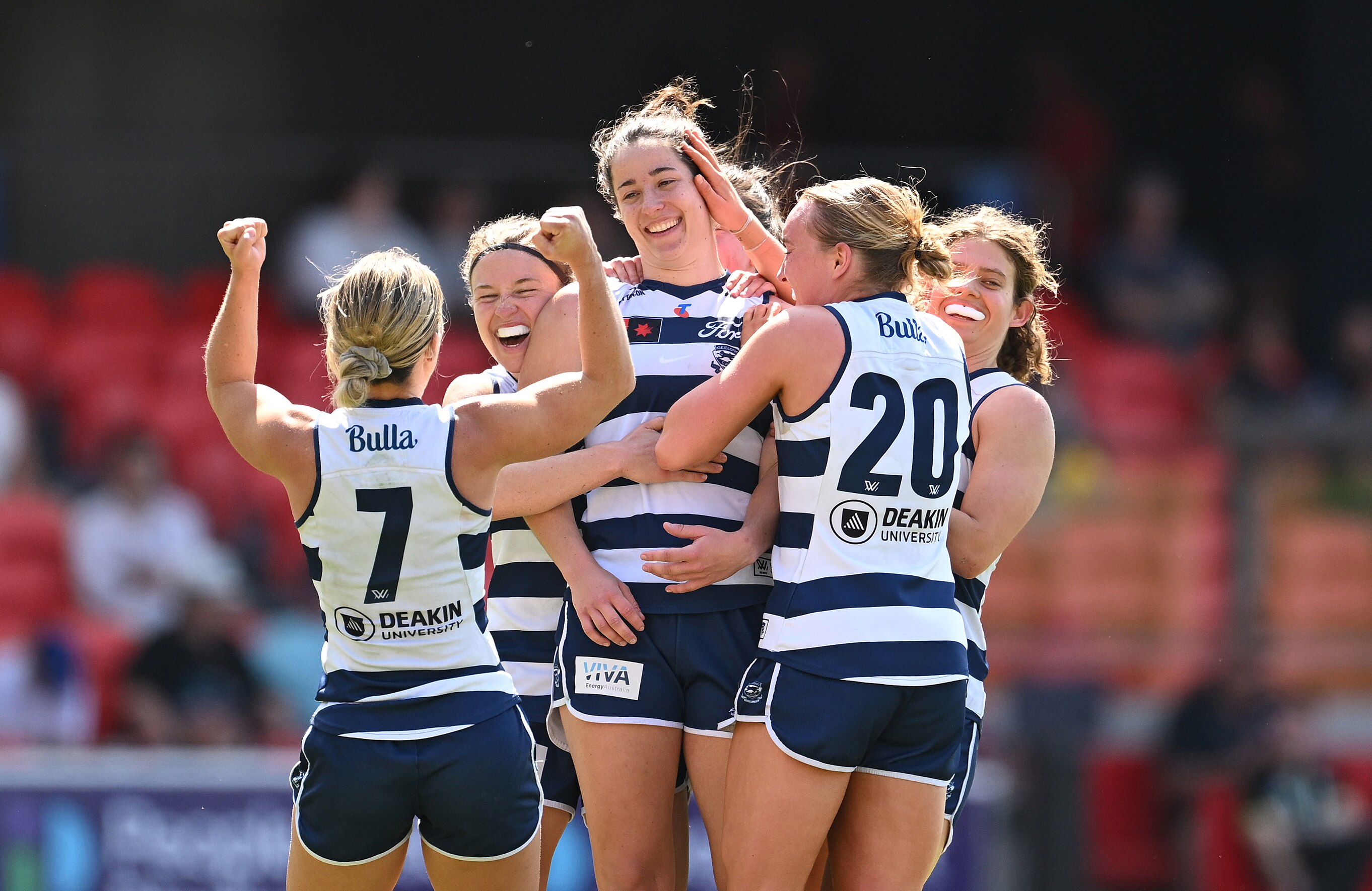 Jacqueline Parry of the Cats reacts after kicking a goal 