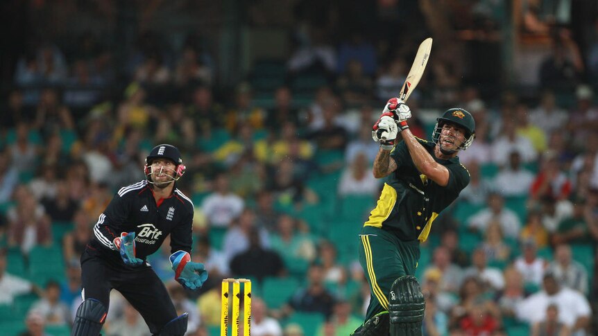 Pinch-hitter ... Mitchell Johnson hits out as Matt Prior looks on.