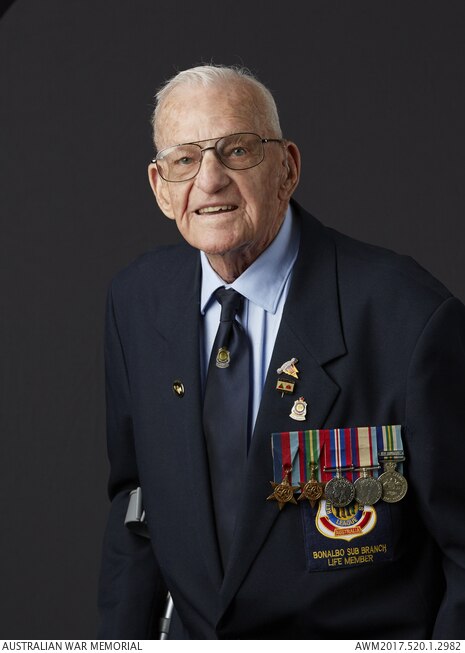 Portrait of Tom Hale with medals