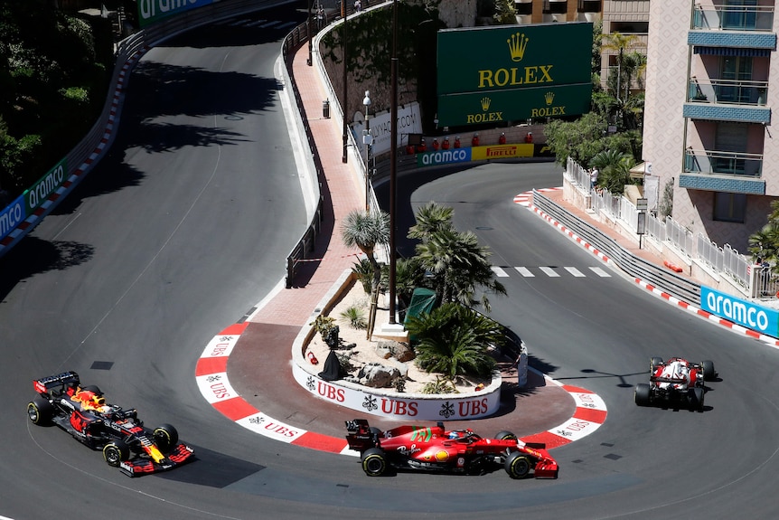 Formula One cars go around the Monaco hairpin