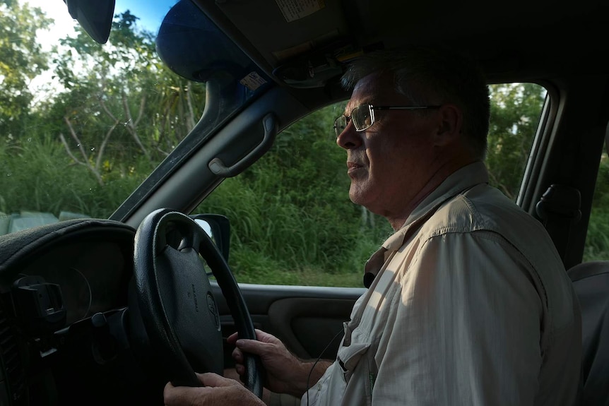 A photo of ecologist Graham Sawyer behind the wheel.