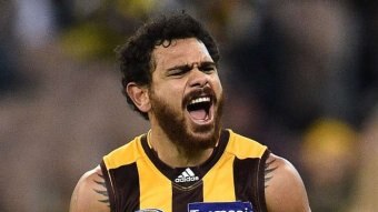 Cyril Rioli celebrates a goal for Hawthorn against Richmond