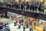 Onlookers at Robina Town Centre after shooting
