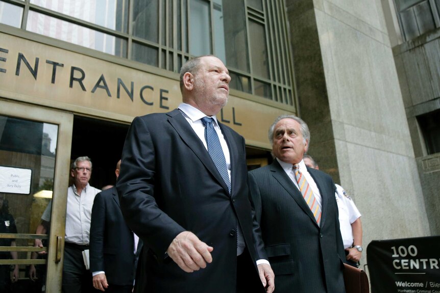 Harvey Weinstein, left, leaves court with his attorney Benjamin Brafman.
