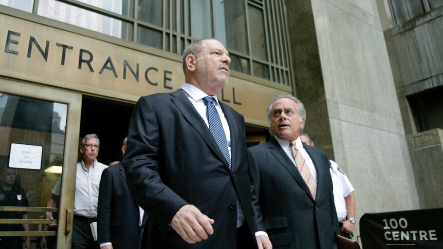 Harvey Weinstein, left, leaves court with his attorney Benjamin Brafman.