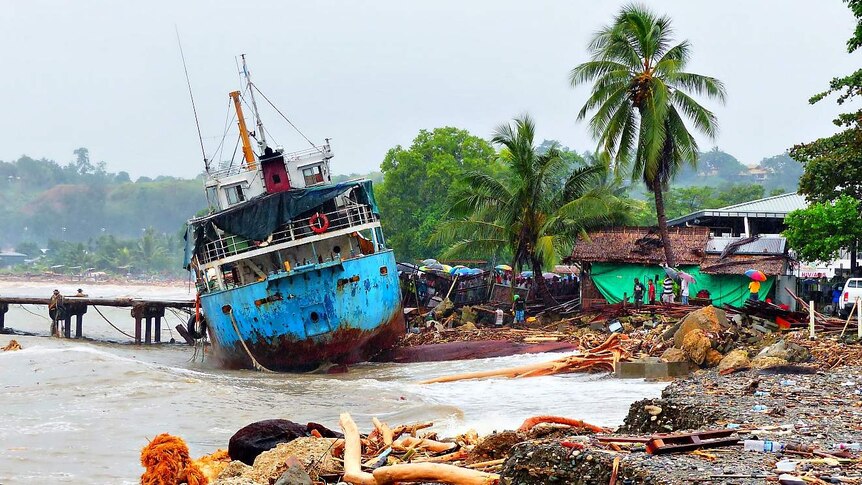 A ship sits on the shorefront after days of heavy rain in the Solomon Islands.