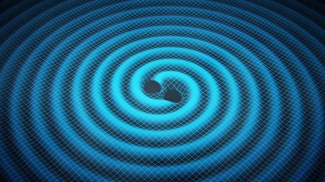 Artists impression of two merging black holes sending gravitational waves ripples through the fabric of spacetime.