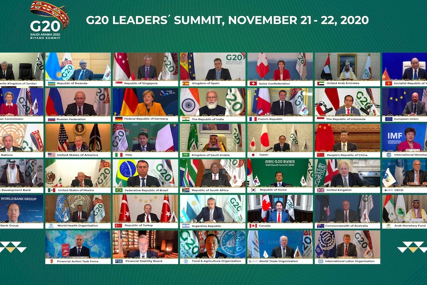 A screen shows some participants of the virtual G20 meeting, hosted by Saudi Arabia.