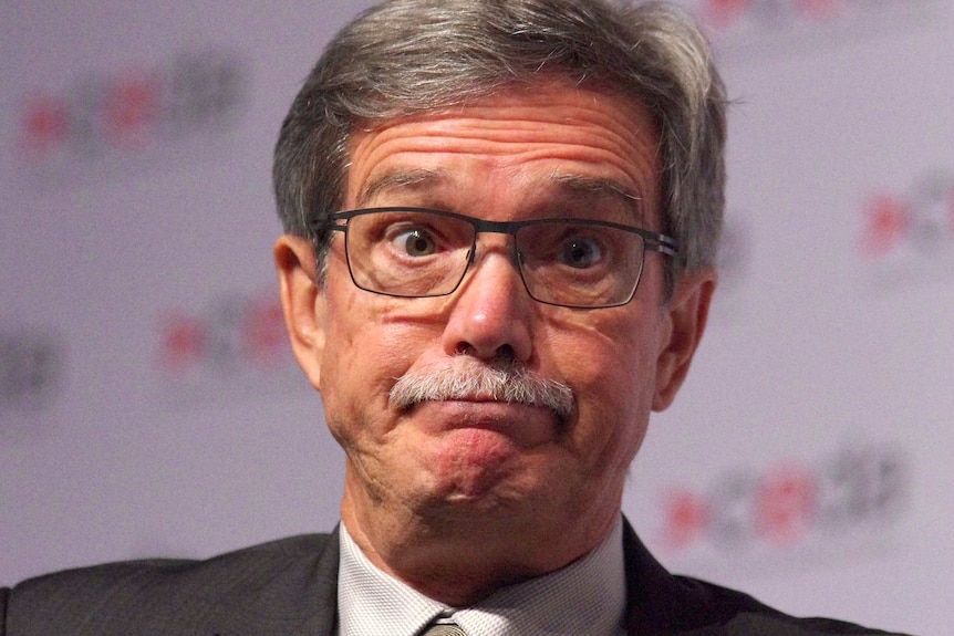 A close-up of WA Treasurer Mike Nahan frowning.