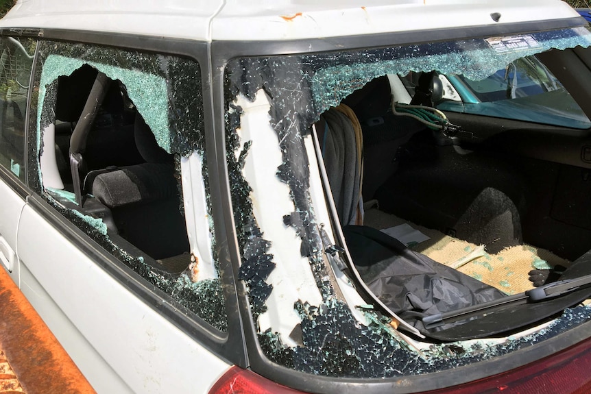 Car with smashed up windows Hobart Police garage, January 19, 2017