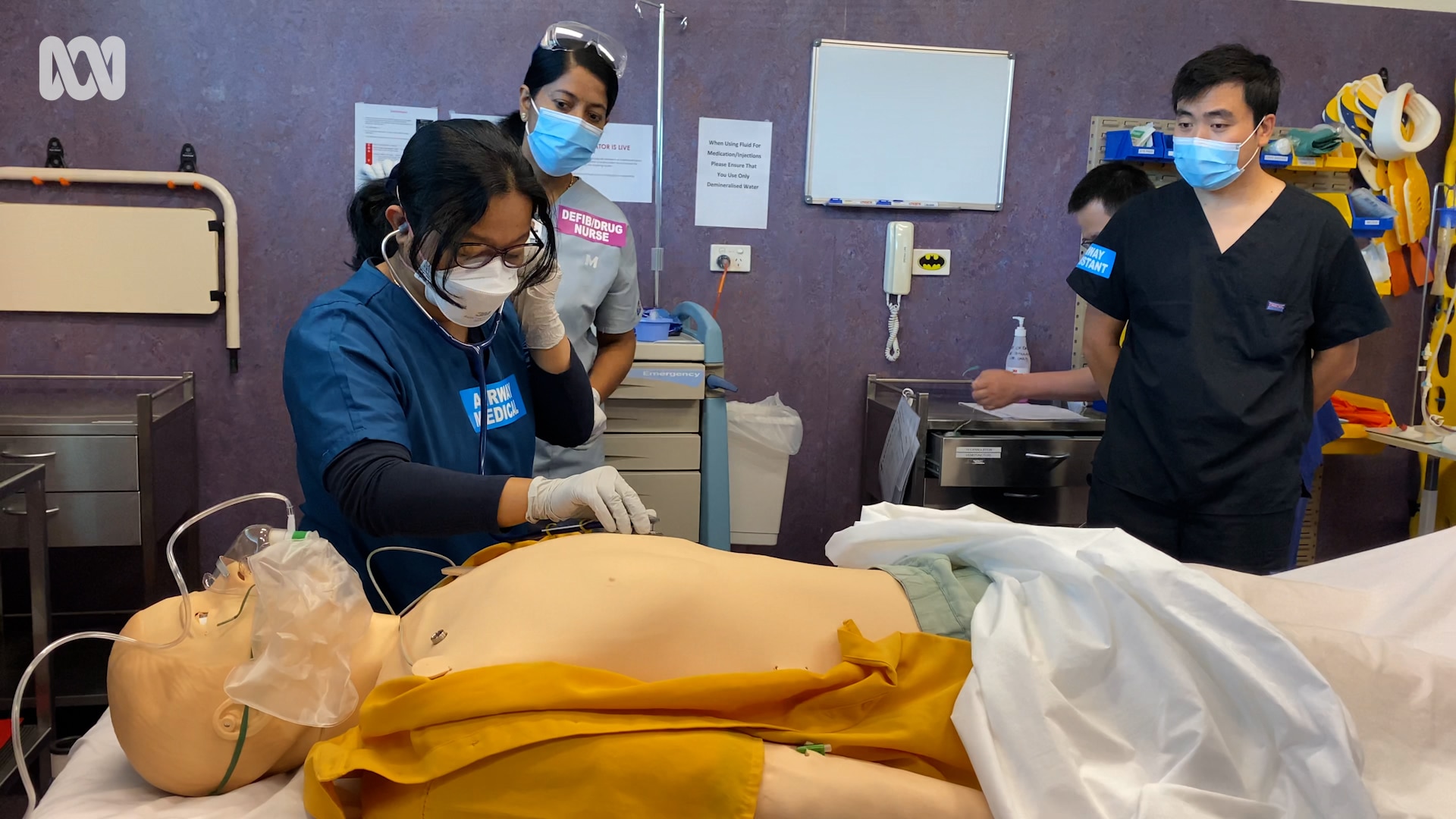 doctor treating mannequin