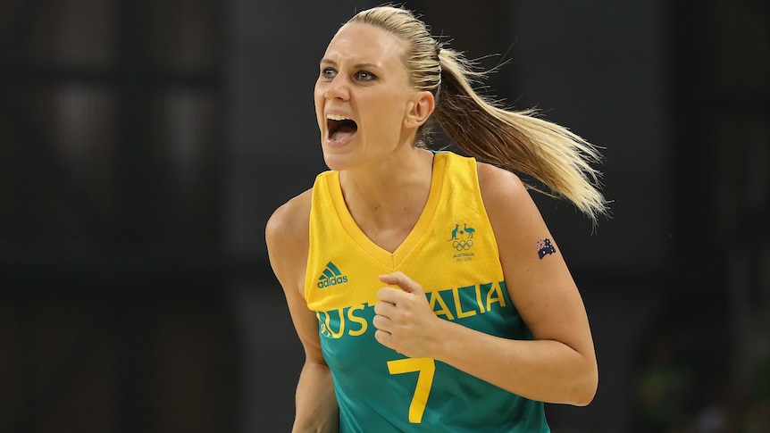 An Australian female basketball reacts after scoring during a game at the 2016 Rio Olympics.