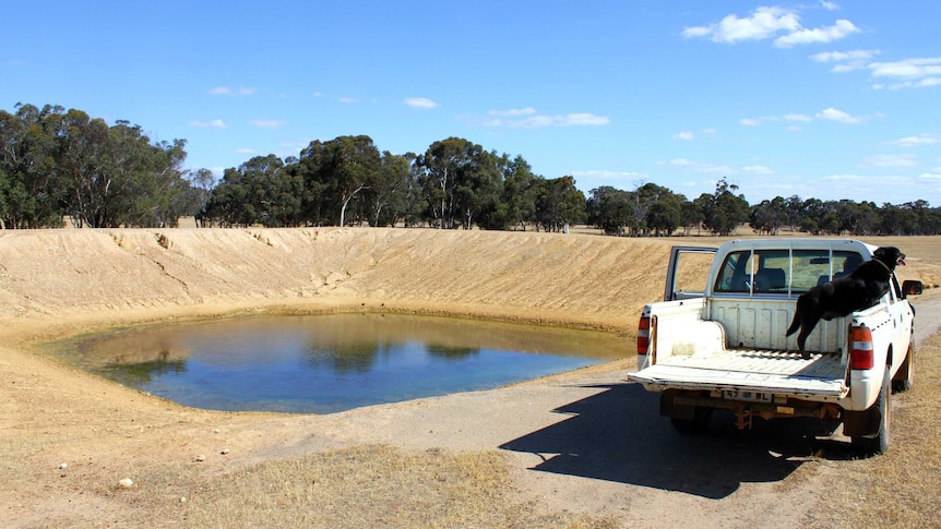 A dam which is filled with one quarter water.