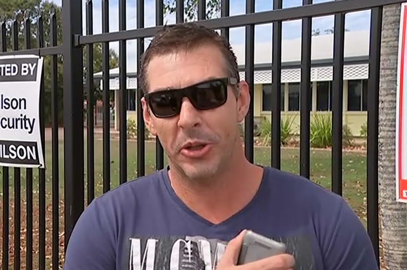 Parent Michael Ryan, speaking outside Heatley State School in Townsville.