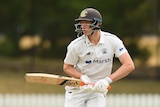 Cricketer Cameron Bancroft looks to take a run during a game.