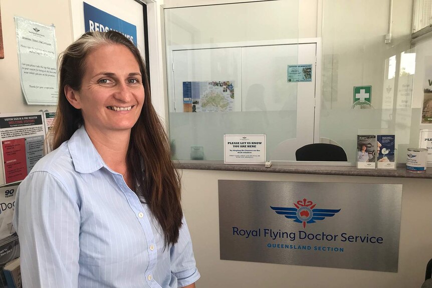 Jos Middleton standing in the Royal Flying Doctors office in Longreach.