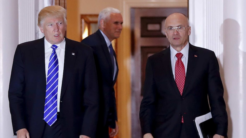 Donald Trump walking with Andrew Puzder.