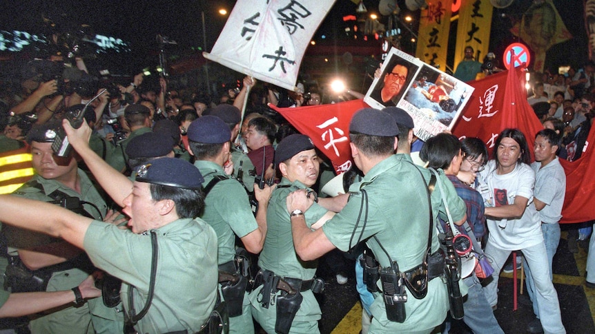 Anti-Beijing radicals try to push through police lines.