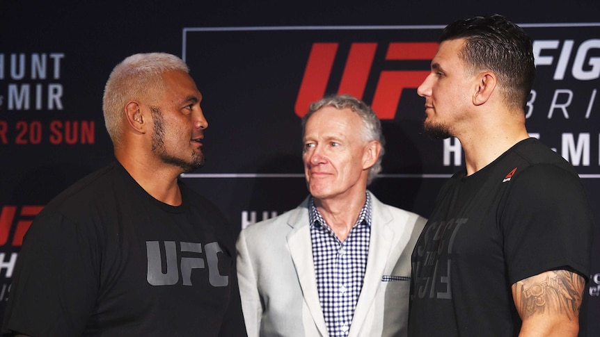 Mark Hunt (left) and Frank Mir (right) weigh-in on Friday before Sunday's UFC fight.