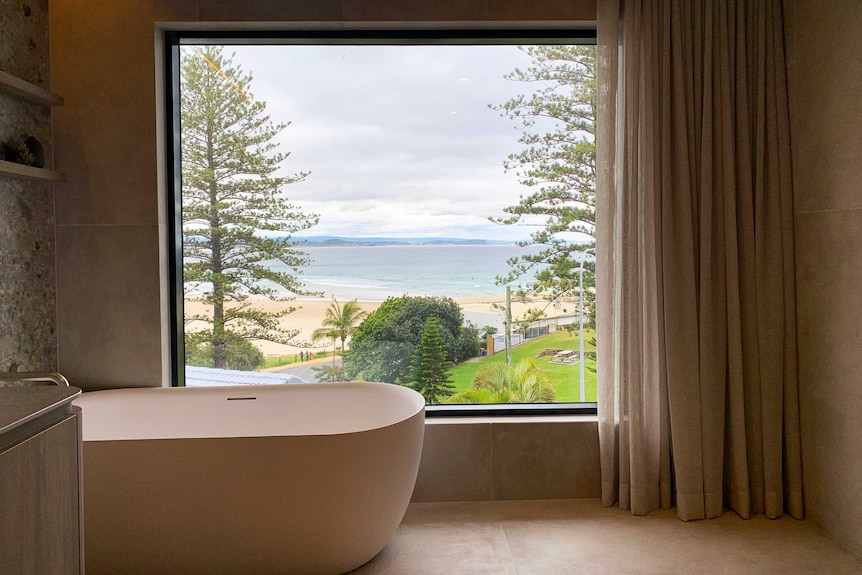 bathroom overlooking beach