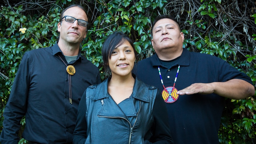 Northern Arizona University program director Chad Hamill with Indigenous exchange students Erica Kallestewa and Merle Begay.