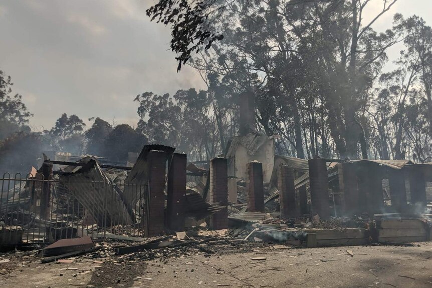 The burnt remains of a structure affected by the bushfire at Cudlee Creek.