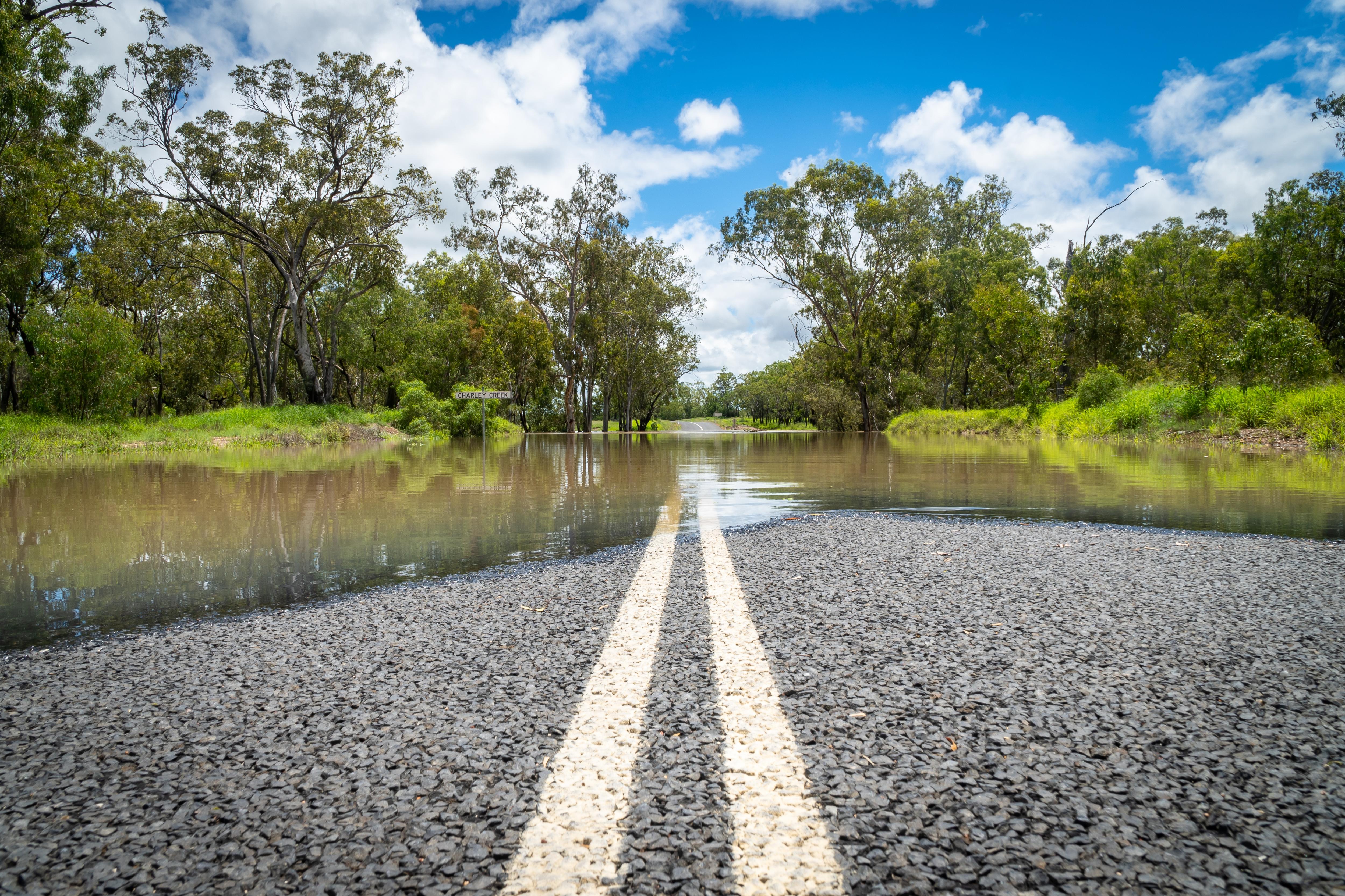 A flooded road, with the text "Flood"