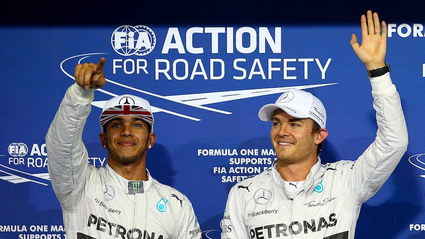 Lewis Hamilton (L) and Nico Rosberg of Mercedes after qualifying for the Abu Dhabi F1 grand prix.