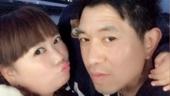 Xiaojun Chen, his wife Lihong Wei and ne of their two children.