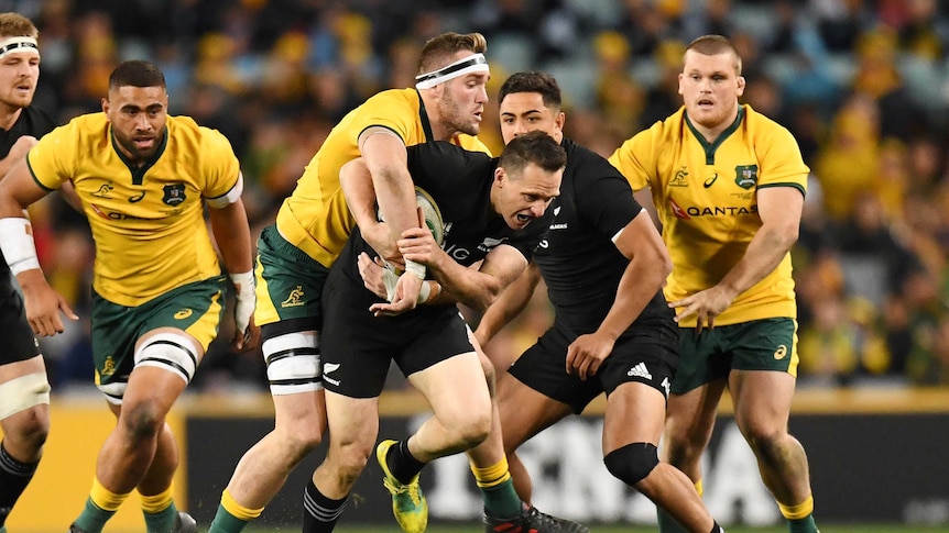 Ben Smith is tackled by Izack Rodda in the opening Bledisloe Cup Test.