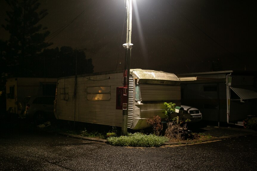 A caravan at night