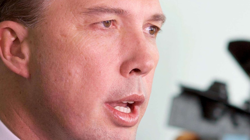 Minister for Immigration and Border Protection, Peter Dutton, speaks with reporters in Canberra