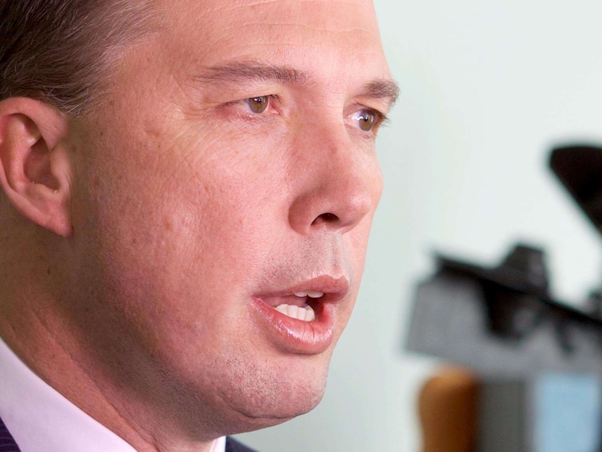 Peter Dutton speaks with reporters