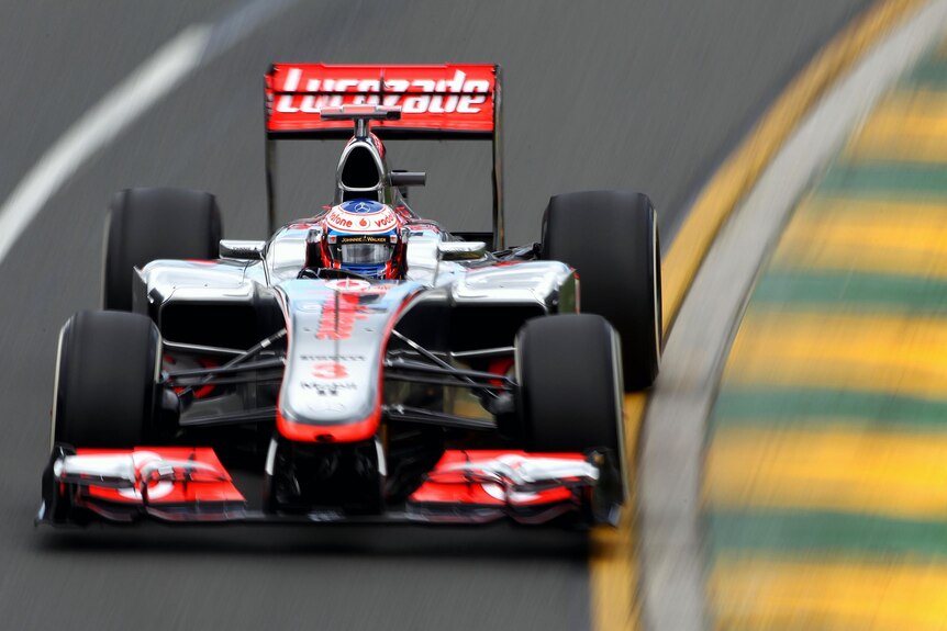 Jenson Button tears up Albert Park circuit during practice for the Australian F1 Grand Prix.